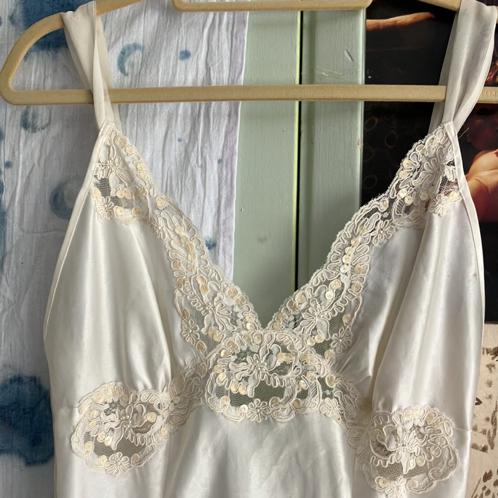 White Victorias Secret nightgown. Size medium, polyester, beading detail, slit